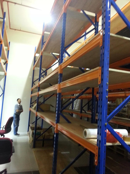 Warehouse racking with multiple storage tiers