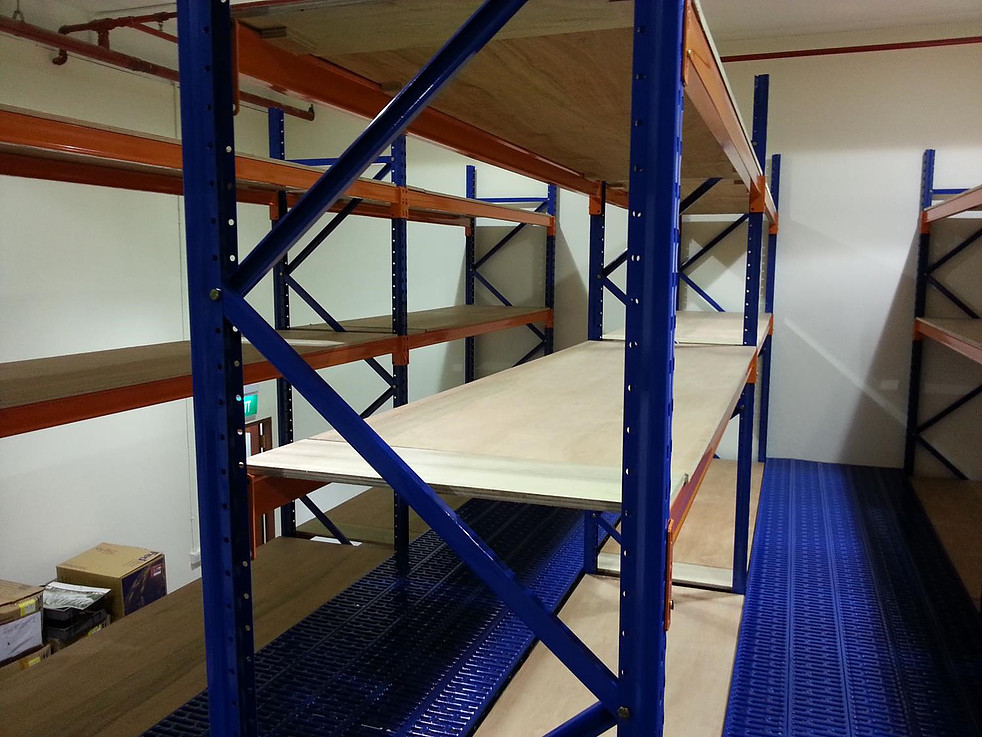 Multi-tier rack structure within a warehouse