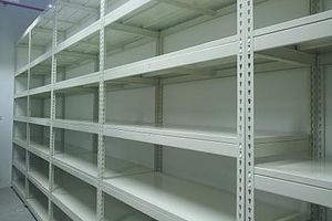 Empty boltless shelving bays ready for a new storage setup