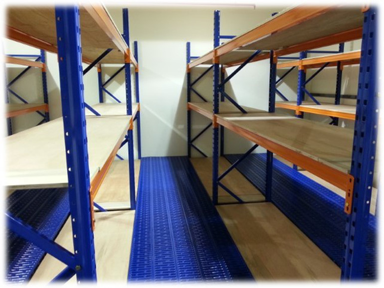 Multi-tier racking layout for packaged goods